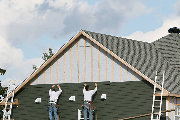 Professional Siding Installation technician working in Weston, WV
